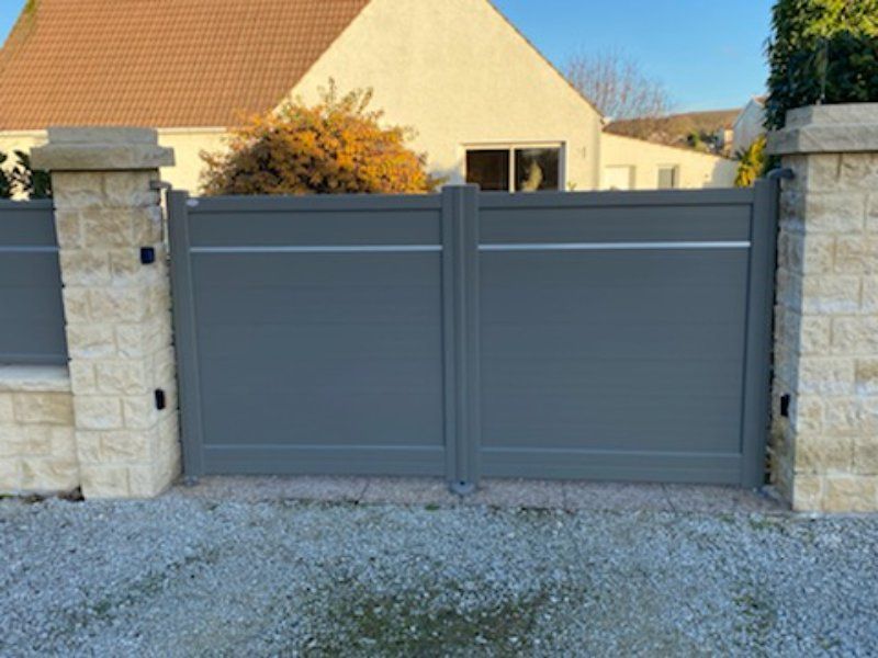pose de porte d'entrée et portail